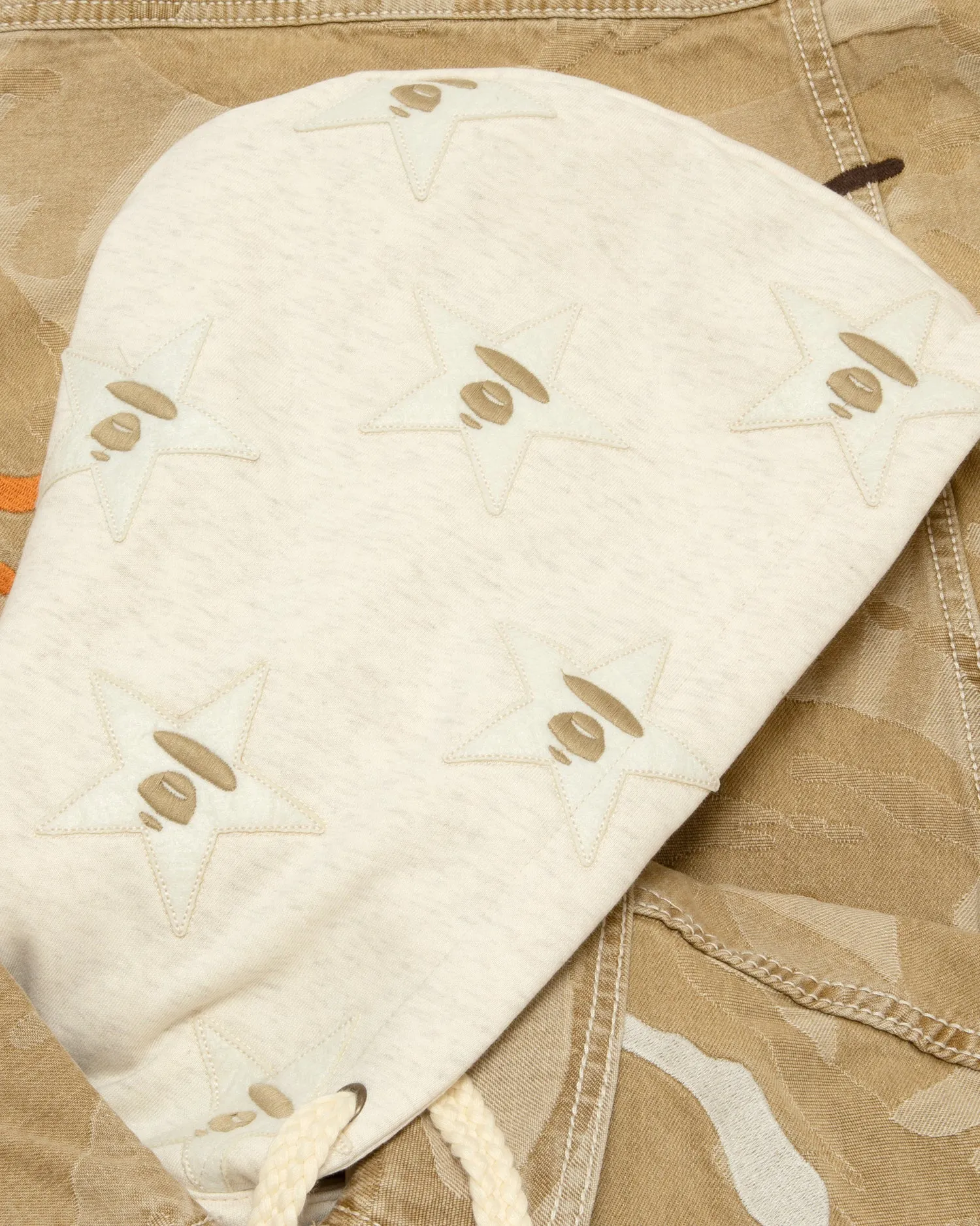 Moonface logo camo hooded denim jacket