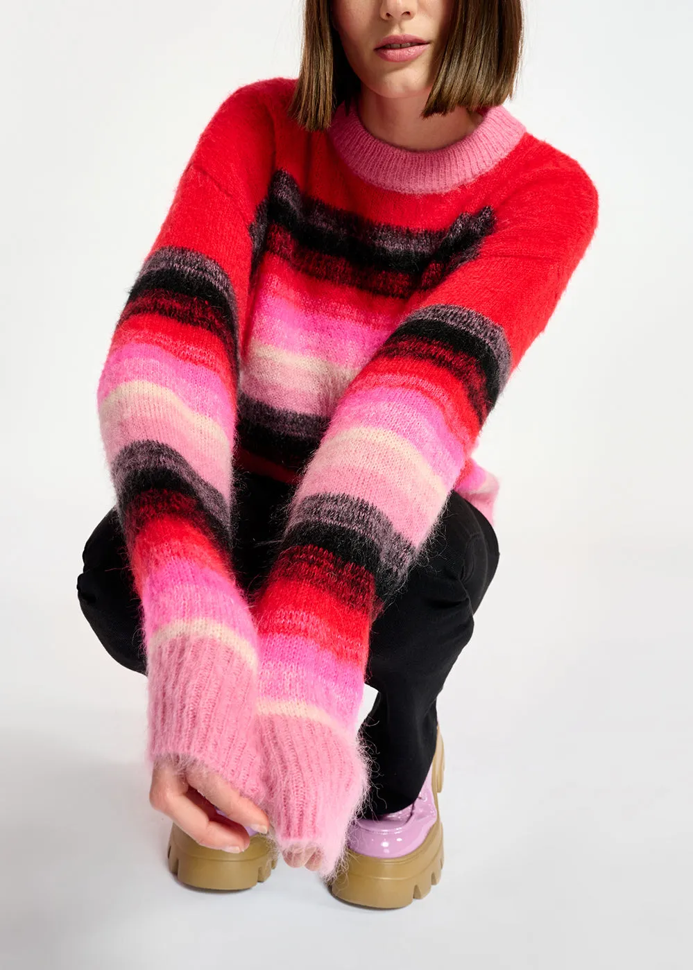 Red, pink and black striped knit sweater