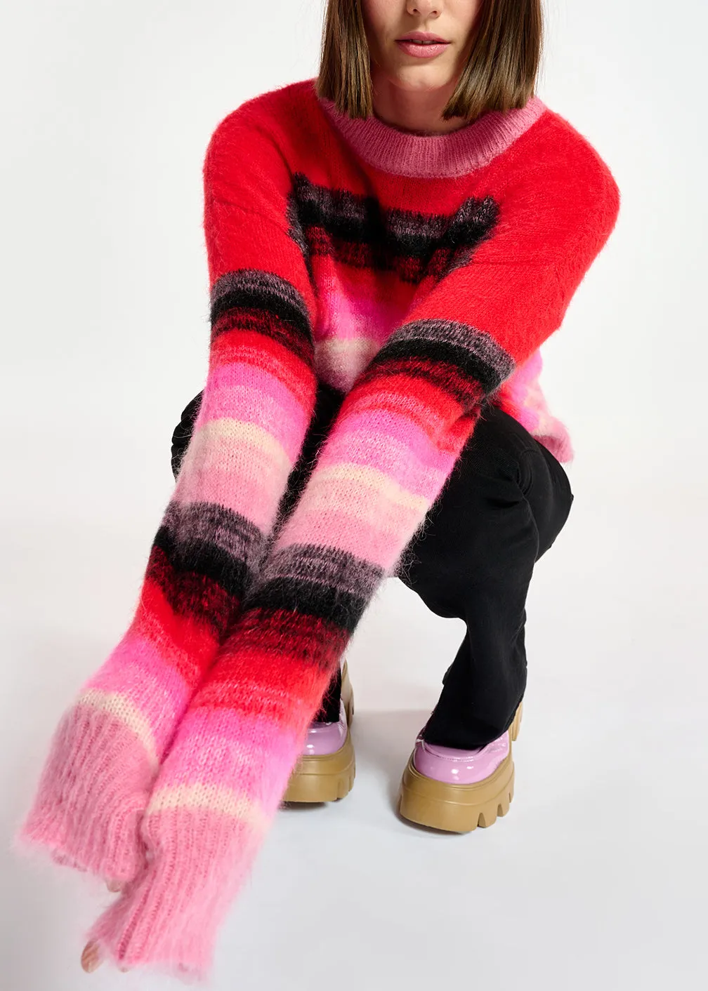 Red, pink and black striped knit sweater
