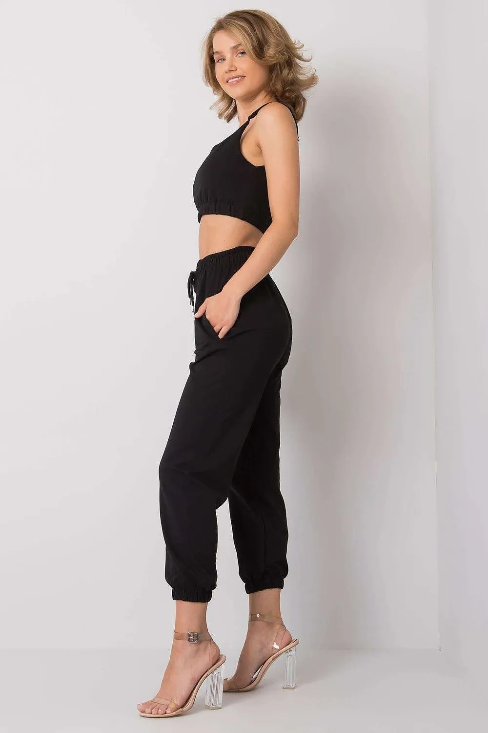 Sports set composed of a top and sweatpants